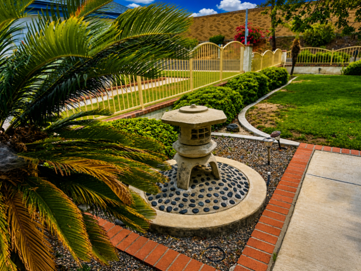 Stone lantern water feature in the landscaped side yard